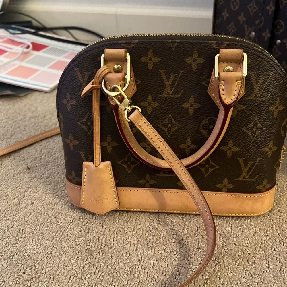 Barley used Louis V bag Alma BB,the paperwork and box in perfect condition